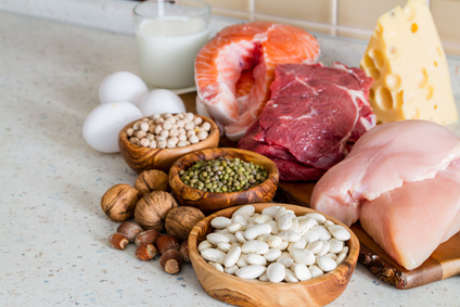 Selection of protein sources in kitchen background, copy space